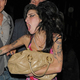Image for article titled Amy Winehouse: Tabloid Victim Or Carefully-Curated "Trainwreck"?